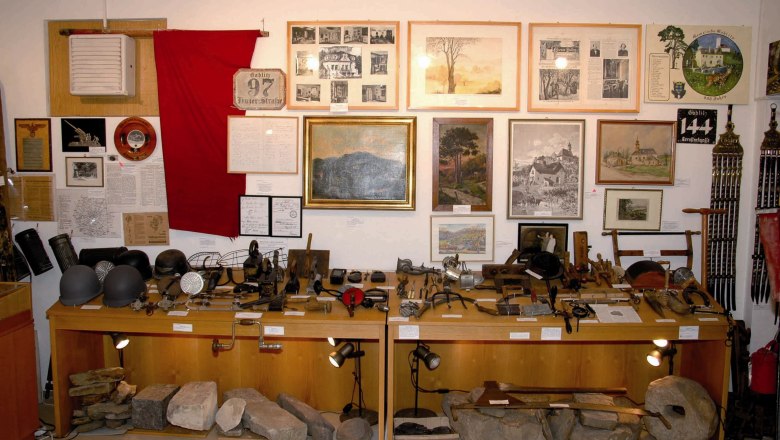 Exhibition in the Gablitz local history museum with historical tools and pictures.