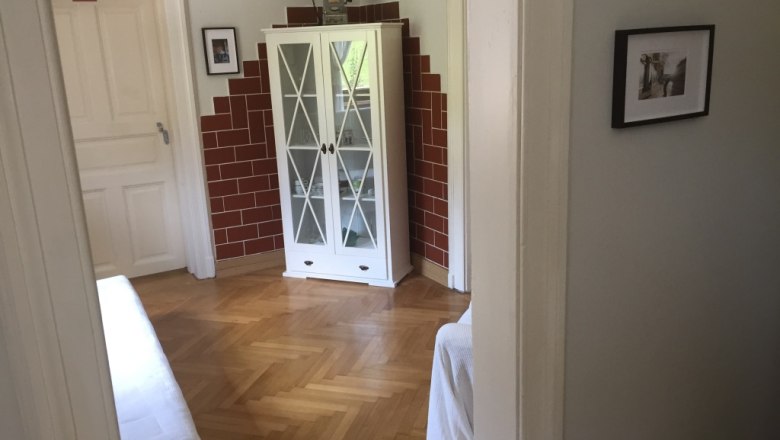 View towards the living room/bedroom in the former railroad attendant's apartment, &copy; M. Schorn