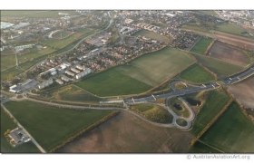 Aerial view of Zw&ouml;lfaxing with streets, fields and buildings.